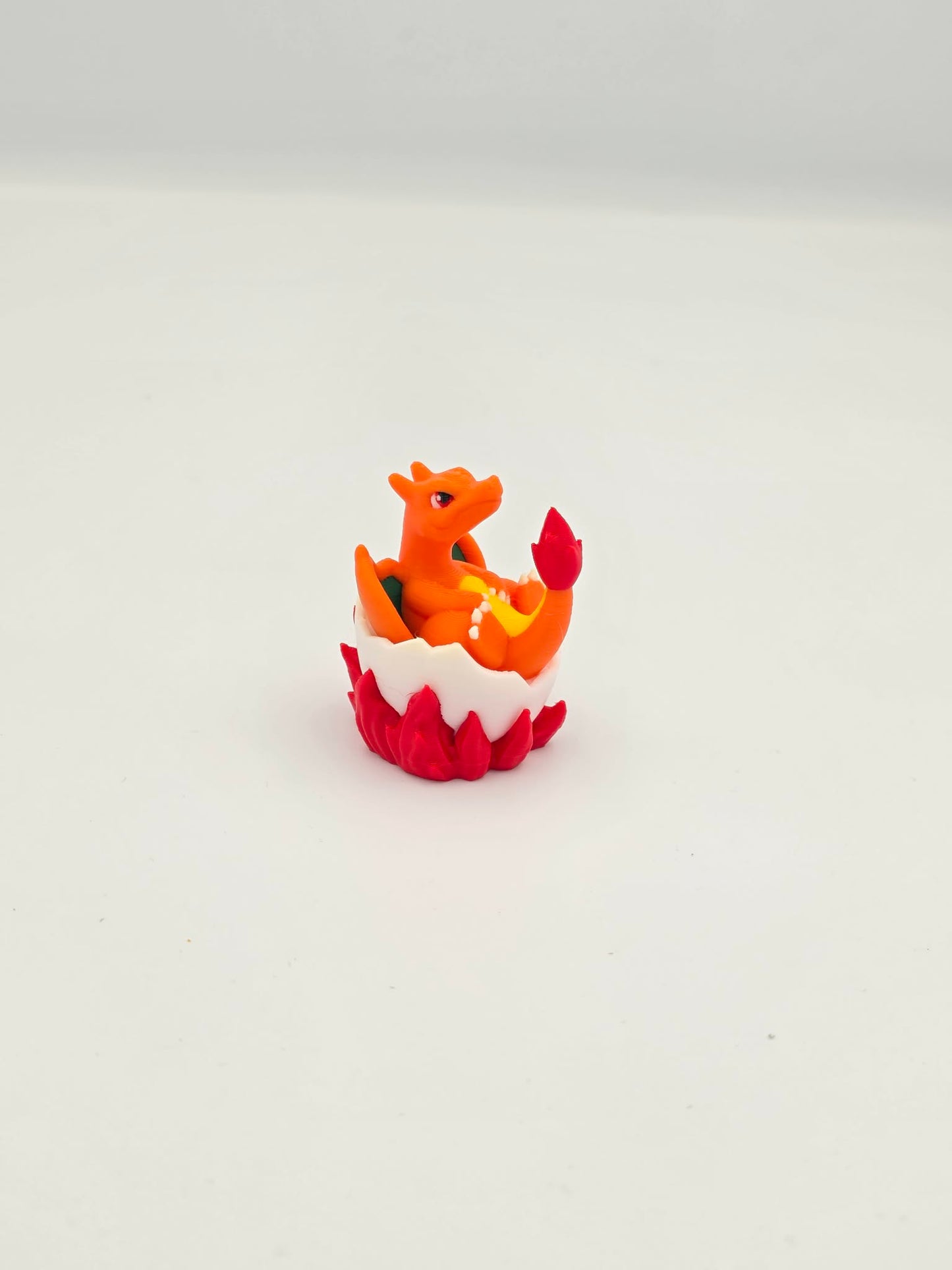 Charizard in Egg – Hatchling Dragon Figurine