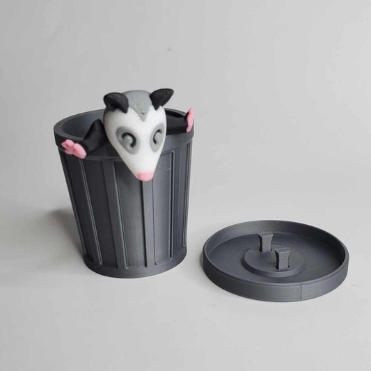 Possum with trash can