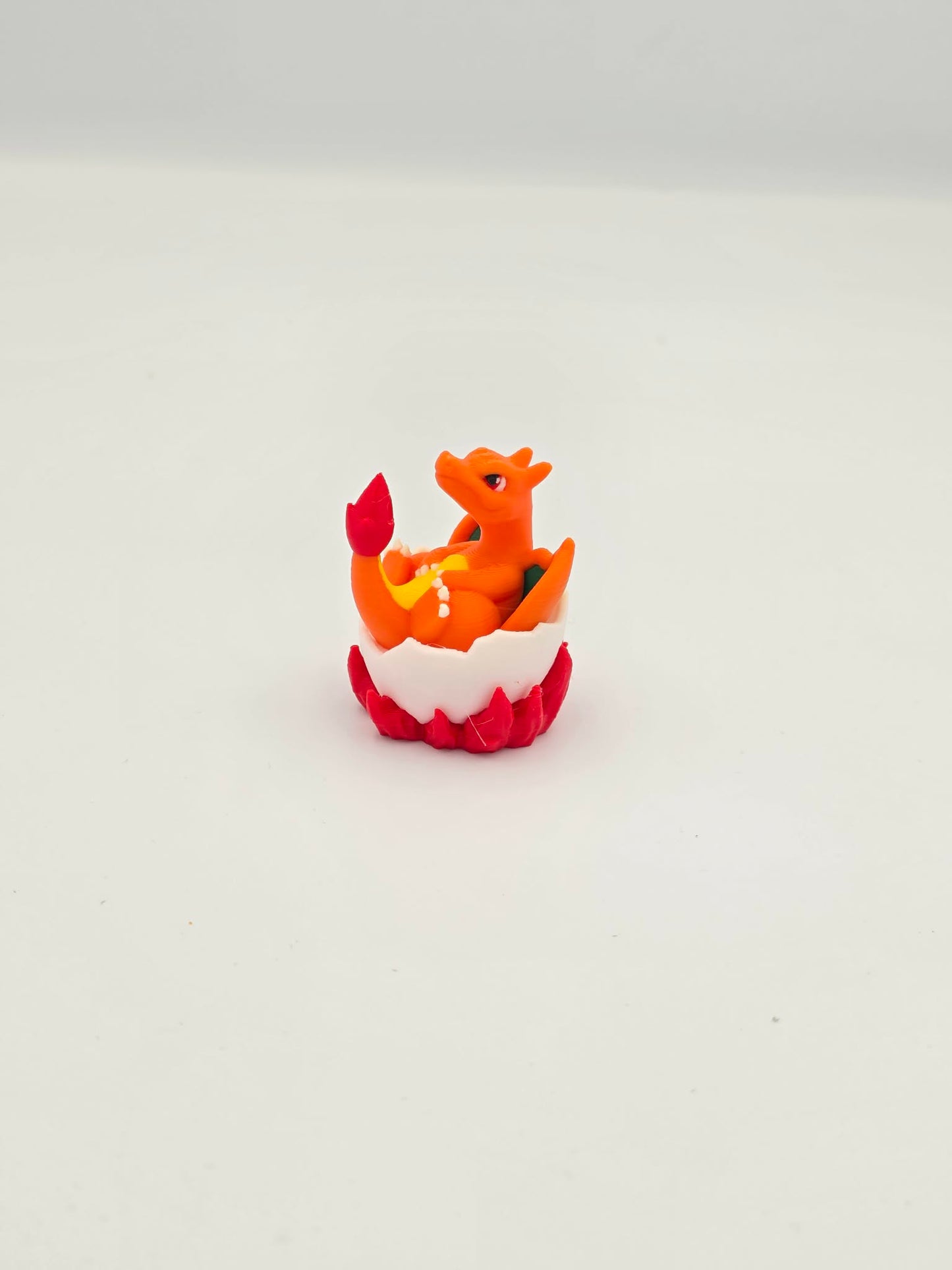 Charizard in Egg – Hatchling Dragon Figurine