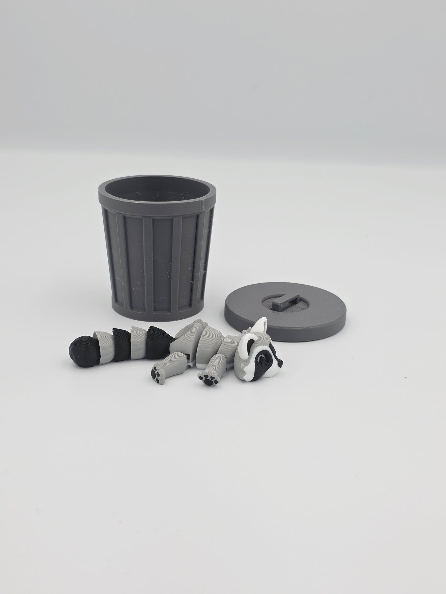 Racoon with trash can